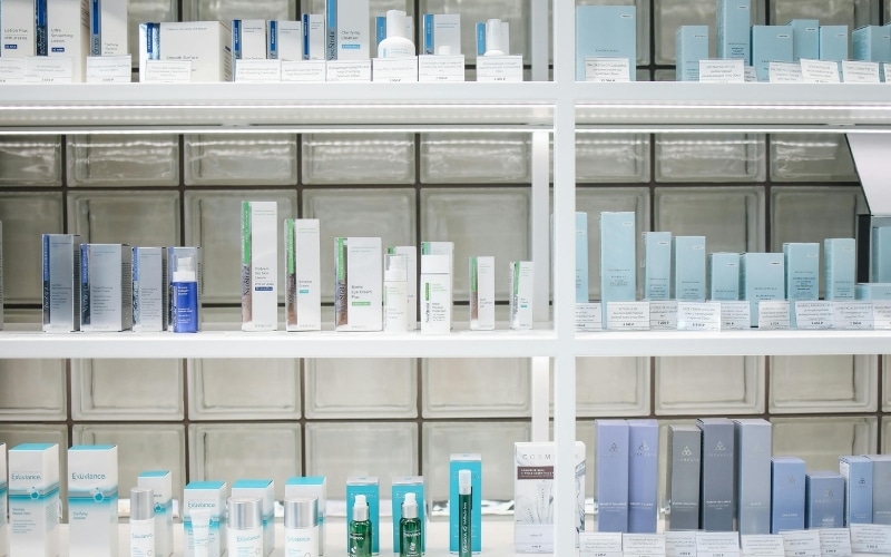 Personal care products - nutraceuticals - sit along a shop wall.