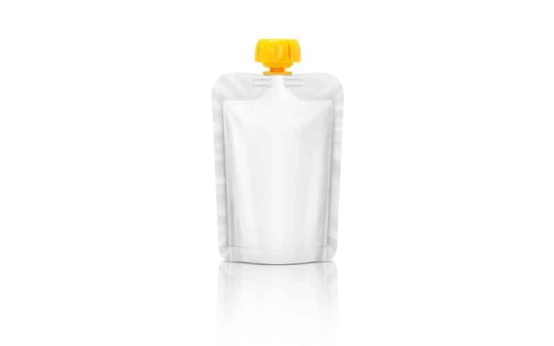 A single food pouch with a yellow lid.