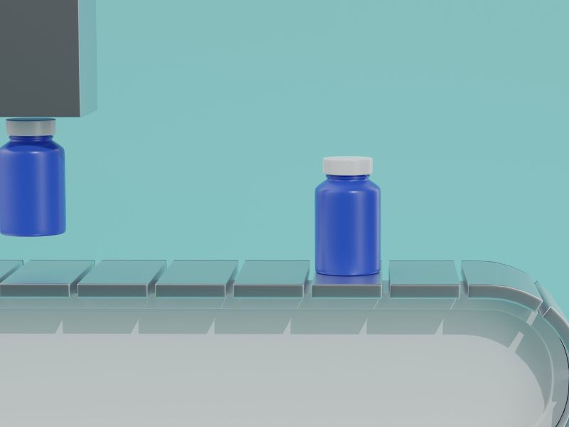 A blue plastic pill bottle runs along a packaging conveyor belt.