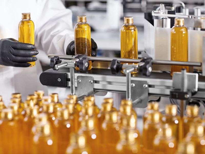 Bottles are filled on an assembly line in a contract packaging facility.